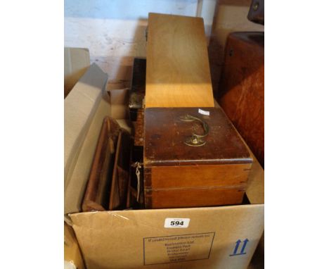 A box containing assorted boxes including microscope case, slide case, stationary rack, etc.