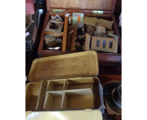 An old wooden First Aid box and assorted contents including brass handles, weights, button sticks, etc. - sold with an old El