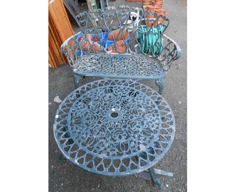 A reproduction painted aluminium curved back two seater garden bench - sold with similar circular garden table