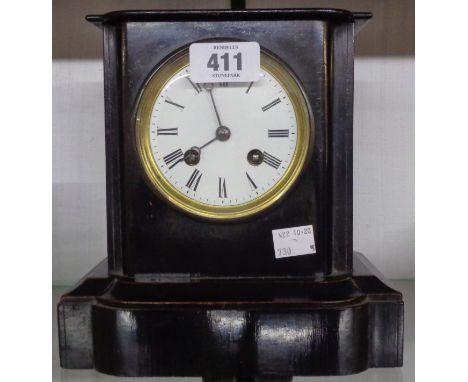 A late Victorian simulated black slate cased mantle clock with Vincent silver medal eight day bell striking movement