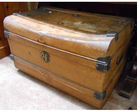 A 72cm late Victorian tin lift top travelling trunk with remains of japanned finish - latch missing, top dented