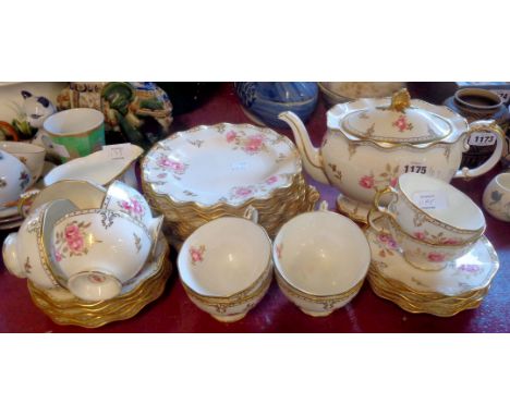 A Royal Crown Derby Royal Pinxton Roses part tea set comprising ten trios, teapot and milk jug