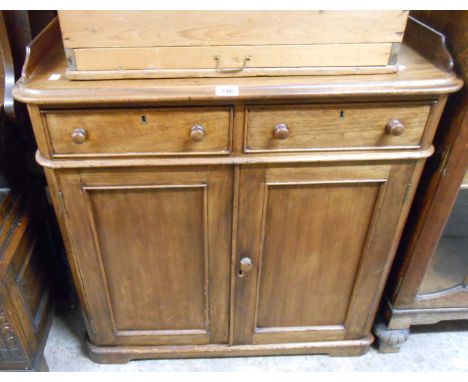 An 82cm Victorian mahogany washstand with low raised splashback, two frieze drawers and pair of panelled doors under, set on 