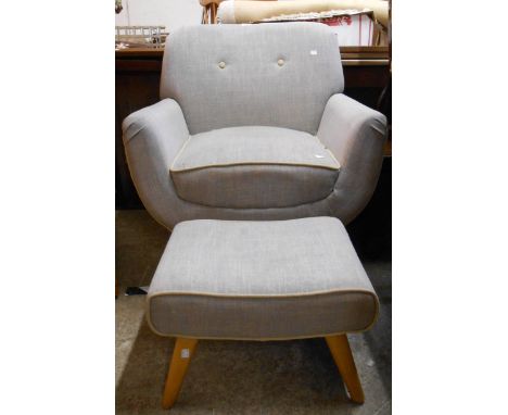 A retro style low armchair with button back grey upholstery, set on polished wood splayed legs - sold with a foot stool to ma