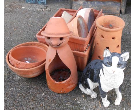 A selection of modern terracotta bowls, oblong planters, conical planter, figural planter and plastic cat