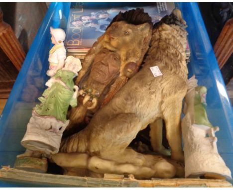 A box containing assorted items including Book of Life magazines, ceramic figurines, etc.