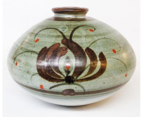 A large David Leach studio pottery vase of flattened ovoid form, decorated with hand painted stylised flower heads in brown w
