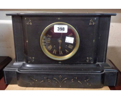 A late Victorian black slate cased mantle clock with gilt Roman numerals to black dial and eight day bell striking movement