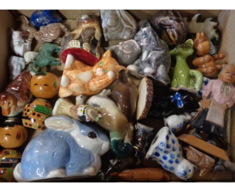 A collection of animal figurines including Wade, Royal Copenhagen, Lomonosov, etc. - various condition