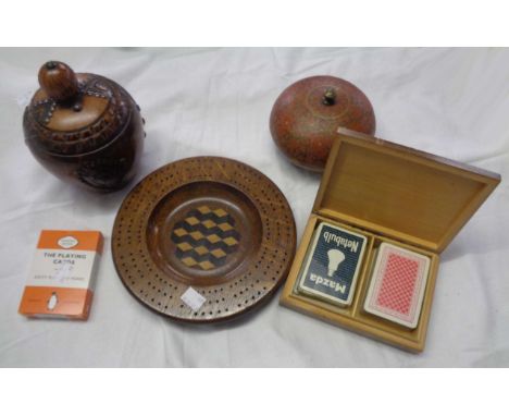 An ornate papier-mache box, a French carved wood box with studded decoration, a card game marker, a box containing two decks 