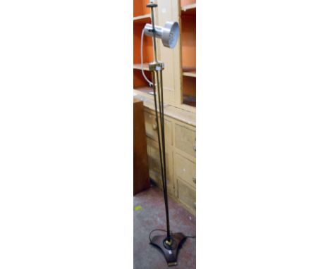 A retro brassed metal and teak lamp standard with later light fitting