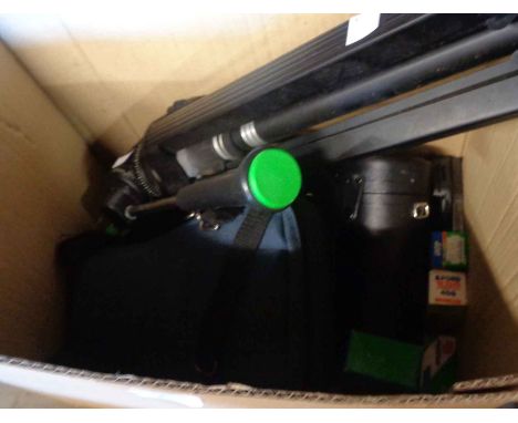 An Olympus OM10 camera with various lenses - sold with film, tripod and cable release