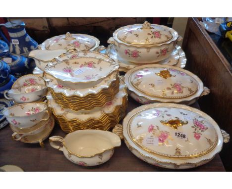 A large collection of Royal Crown Derby Royal Pinxton Roses ware comprising three vegetable tureens, soup tureen, two meat pl