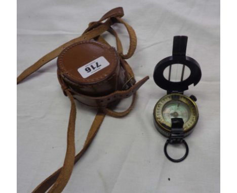 A vintage compass by Watts of London in leather case with strap