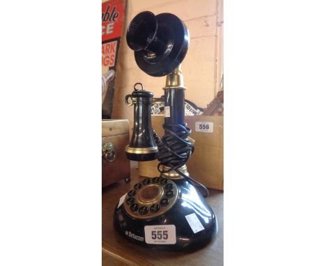 A vintage Betacom push button candlestick telephone