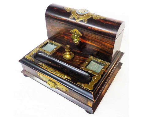 A late 19th Century brass bound coromandel deskstand, the domed topped letter rack with Jasperware style plaque depicting The