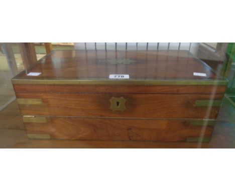 A Victorian mahogany brass bound writing slope with fitted days of the week, note slots to inside of lid and one remaining in