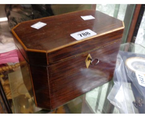 An early 19th Century stripped rosewood and boxwood strung twin compartment tea caddy with remains of original lining - inter