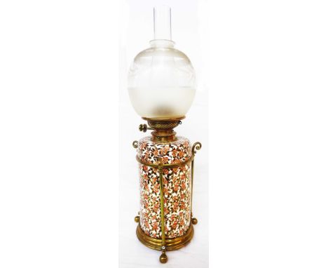 A J. Hinks &amp; Son Aesthetic Movement ceramic and brass table oil lamp, the cylindrical body decorated with allover flower 