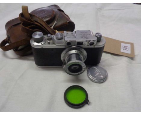 A 1937 Leica II Range Finder camera, serial number 241958, with additional green filter and original leather case