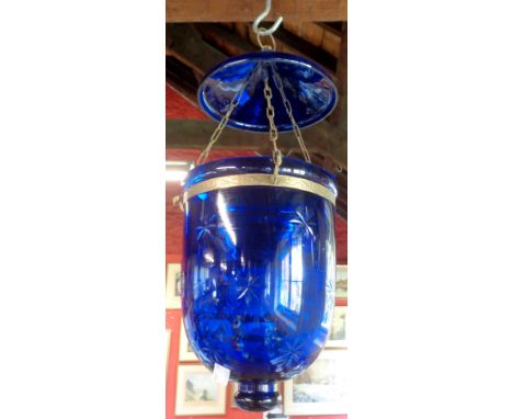 A blue glass hanging ceiling lamp with star cut decoration and gilt metal mounts