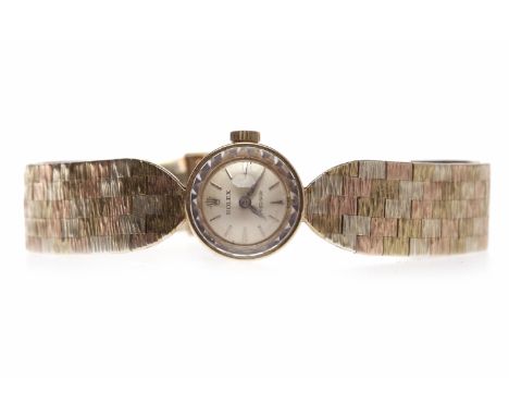 LADY'S ROLEX PRECISION NINE CARAT GOLD MANUAL WIND COCKTAIL WATCHsigned movement numbered 1401, the round dial with applied b