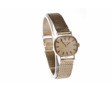 LADY'S LONGINES NINE CARAT GOLD MANUAL WIND WRIST WATCHthe rounded rectangular dial with applied gold baton hour markers, the