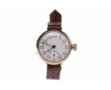 GENTLEMAN'S NINE CARAT GOLD MANUAL WIND WRIST WATCH1930s, unsigned 15 jewel movement, the round white dial with Arabic numera
