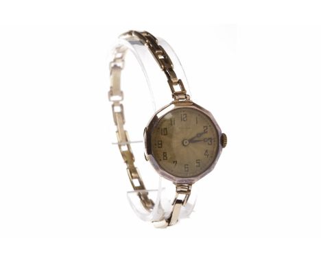 LADY'S ROLEX NINE CARAT GOLD MANUAL WIND WRIST WATCHsigned movement, the round dial with Arabic numerals in black, the 25mm c