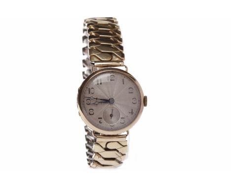 MID SIZE ART DECO NINE CARAT GOLD MANUAL WIND WRIST WATCHunsigned movement, the round dial with Arabic numerals in black, sun
