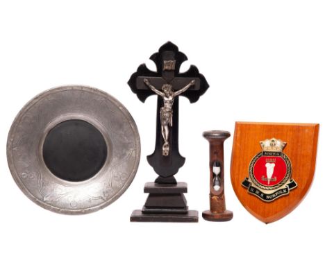 A Continental silver plated and ebonised crucifix, on stand, 32cm h, a late 19th c turned wood bobbin, converted to an egg ti