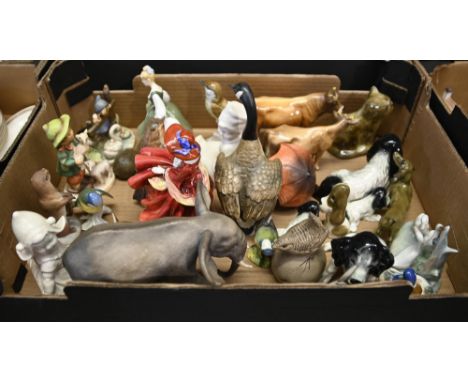 Miscellaneous decorative ceramics, including Royal Doulton and Goebel figurines, Beswick cattle and Coalport elephant, etc  S