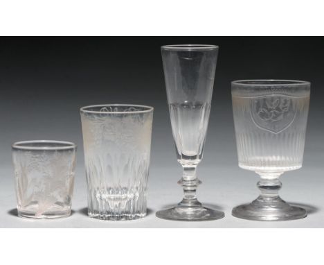 A Regency glass rummer, c1810, the fluted bucket bowl engraved with initials SG in a shield between stiff leaves, on knopped 