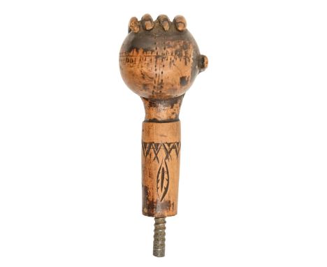 An American carved and stained wood walking cane handle, early 20th c, in the form of a hand holding a baseball, 11cm l, two 