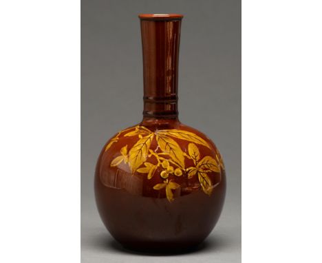 A slipware terracotta bottle vase, first half 20th c, painted with leaves and berries, 22cm h, indistinct impressed mark  In 