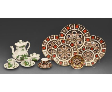 A Royal Crown Derby Imari pattern trio, a pin tray and four plates, late 20th century, 26.6cm diam and smaller, printed mark,
