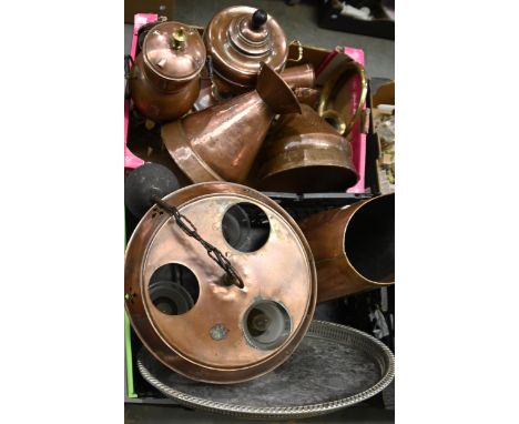 Victorian and later copperware, comprising haystack measures, coal scuttles, tea urns and a hanging chandelier  