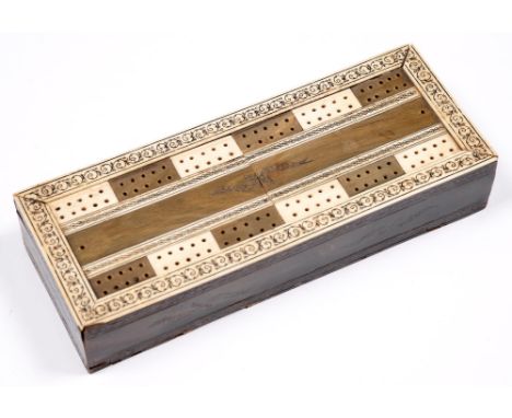 A Victorian horn and bone cribbage box, 24.5cm h; 9.5cm x 5cm  Minor splits, chips and scuffs, mostly to the corners, consist