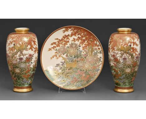 A pair of Satsuma ware vases and a dish, first half 20th c, the vases 29cm h, painted mark (3)  In good condition.