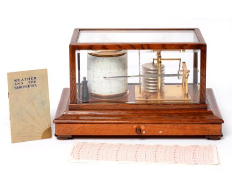 An oak barograph, Negretti &amp; Zambra, London, No C23436, early 20th century,&nbsp;with lacquered brass mechanism and bevel