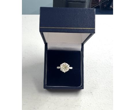 A diamond solitaire ring, approx 3.00 carat diamond weight, set in platinum, size N/O.