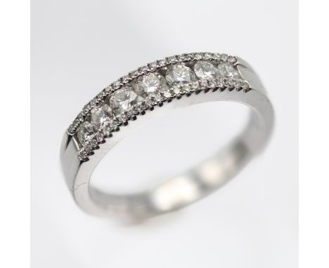 An 18ct white gold diamond ring, 58pts, size M.