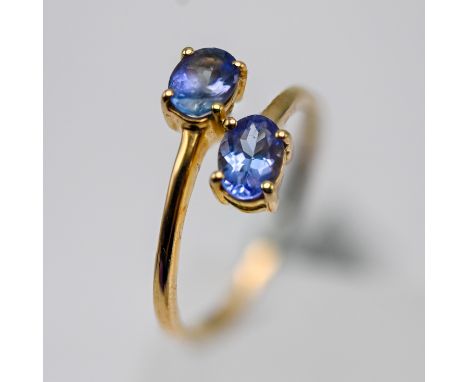 Gemporia, a 9k yellow gold tanzanite ring, size S, with certificate of authenticity.