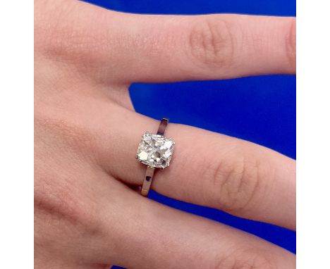 A good cushion old cut diamond solitaire ring set in 18ct yellow gold, in our opinion the diamond weight is very approx 1.50c