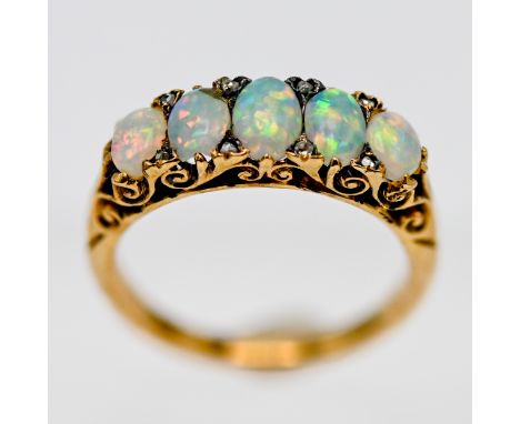 A good opal and diamond five stone ring, size M/N.