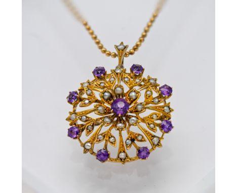 A gold amethyst and seed pearl pendant/brooch on chain (not hallmarked).
