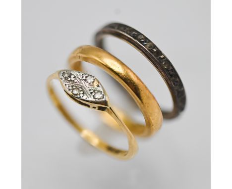 A 22ct gold wedding band ring, approx 3.8g together with a 18ct gold ring approx 1.7g and another ring (not marked) total gol