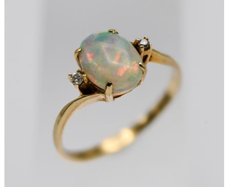 A 14ct gold opal and diamond ring, size M.
