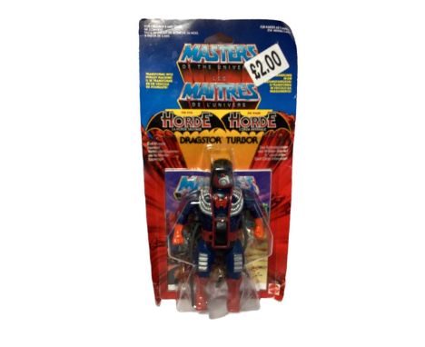 Mattel (c1986) Masters of the Universe (Foreign Version) Dragstor Turbor, on card (curled &amp; splitting to bottom corner) w
