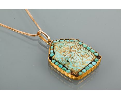 NINETEENTH CENTURY INDO-PERSIAN HAND ENGRAVED GILDED TURQUOISE PENDANT
with the image of a deity, engraved Delhi 1894 to the 